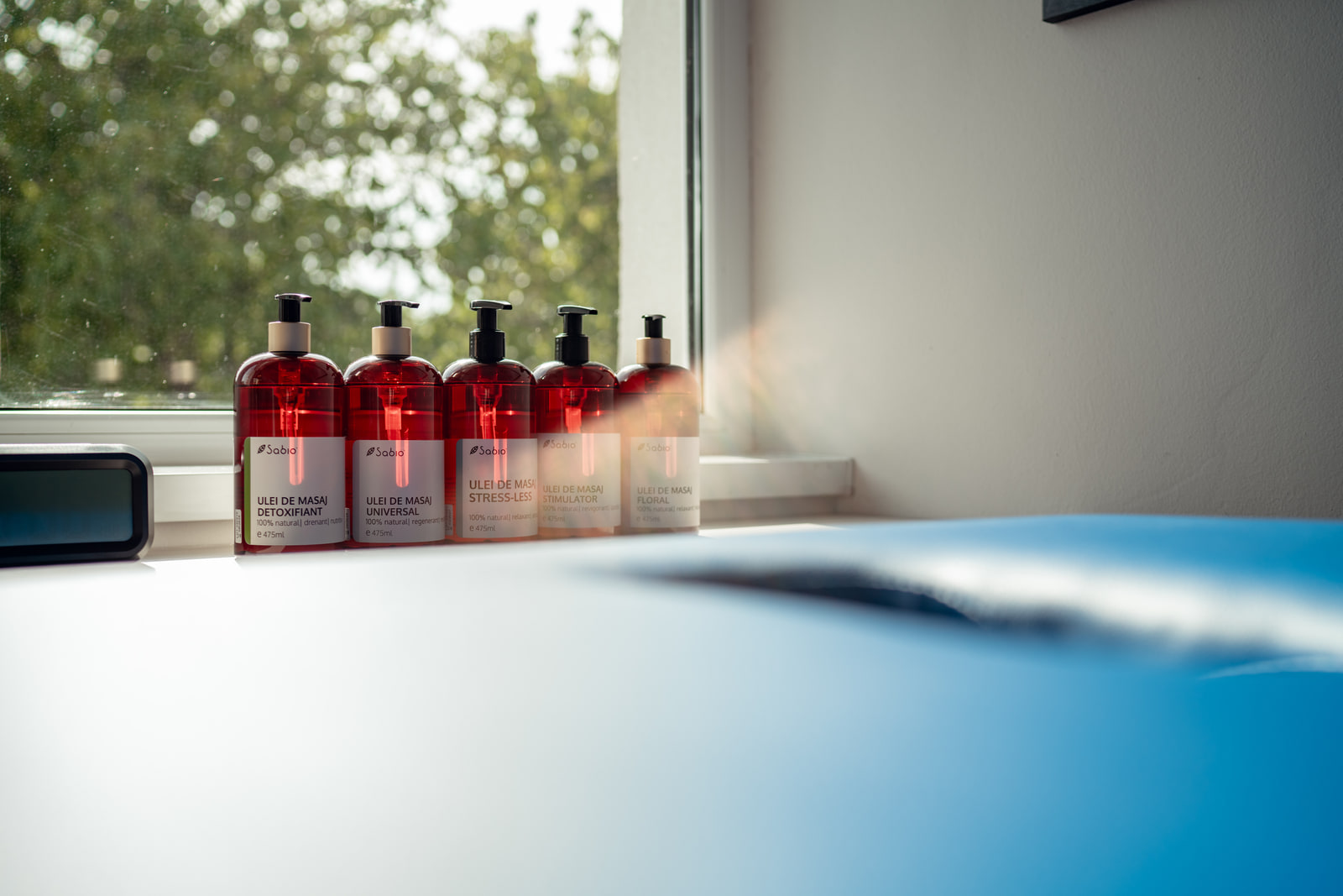 Detaliu ulei de masaj premium — atmosferă de relaxare la Sanoria Scobinți